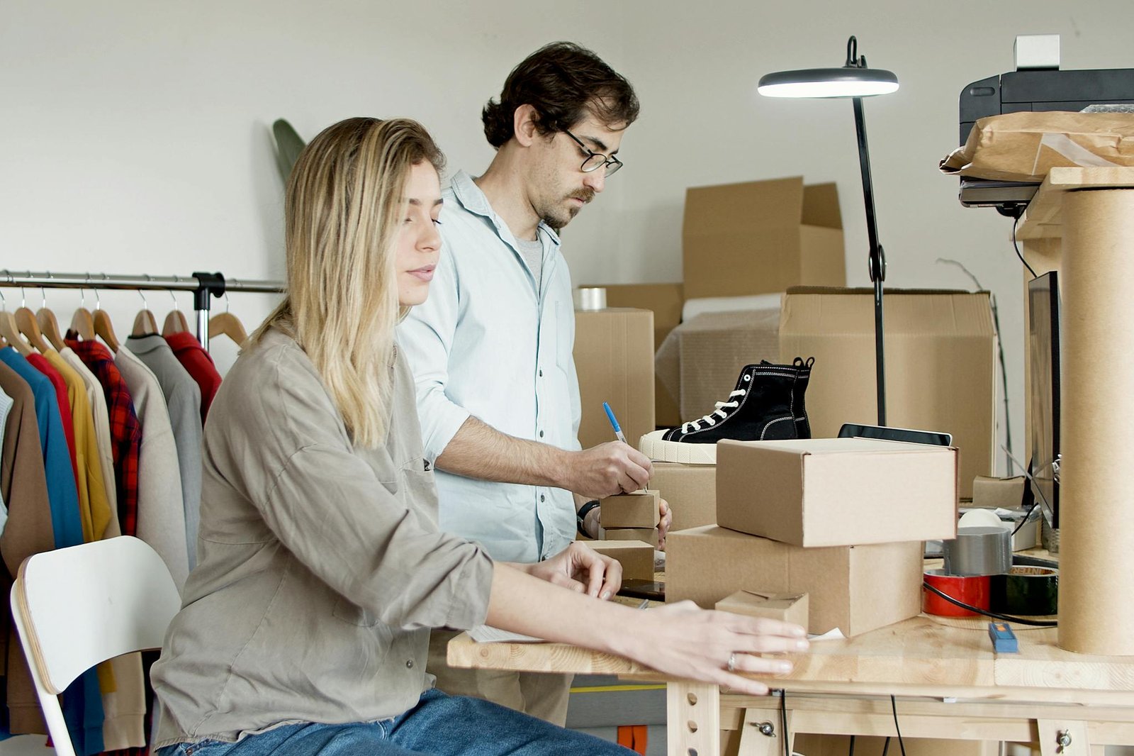 Couple Busy with Packaging Their Products